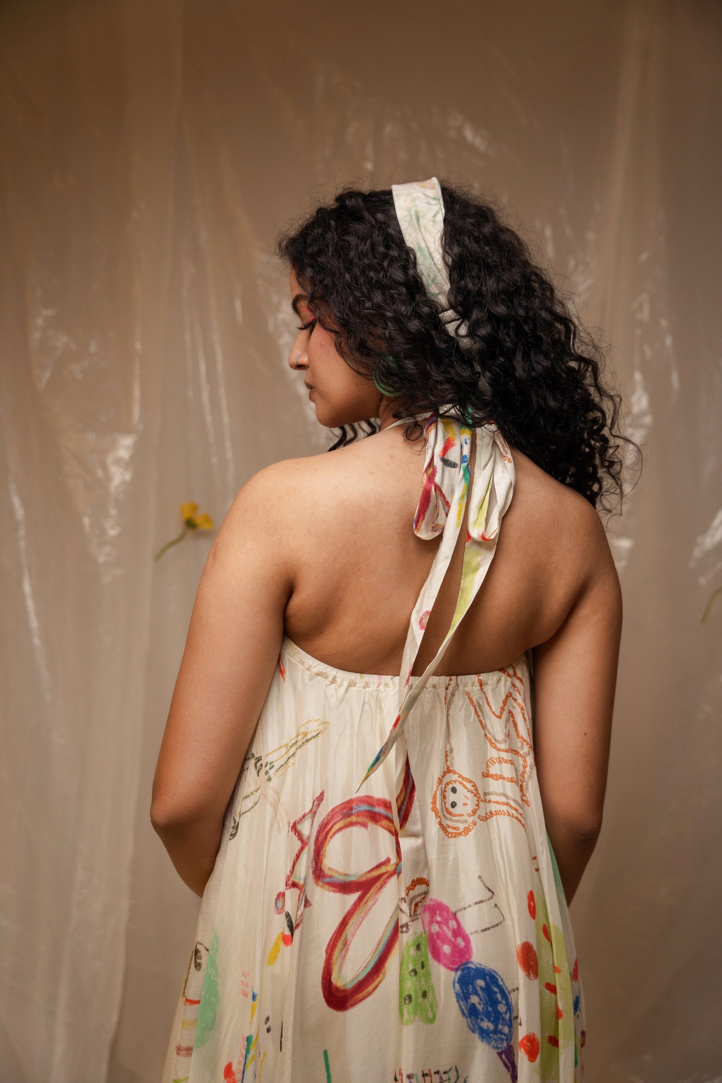 NACREOUS ARBITRARY HALTER
NECK DRESS
